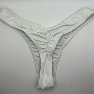Never worn. White. Small.